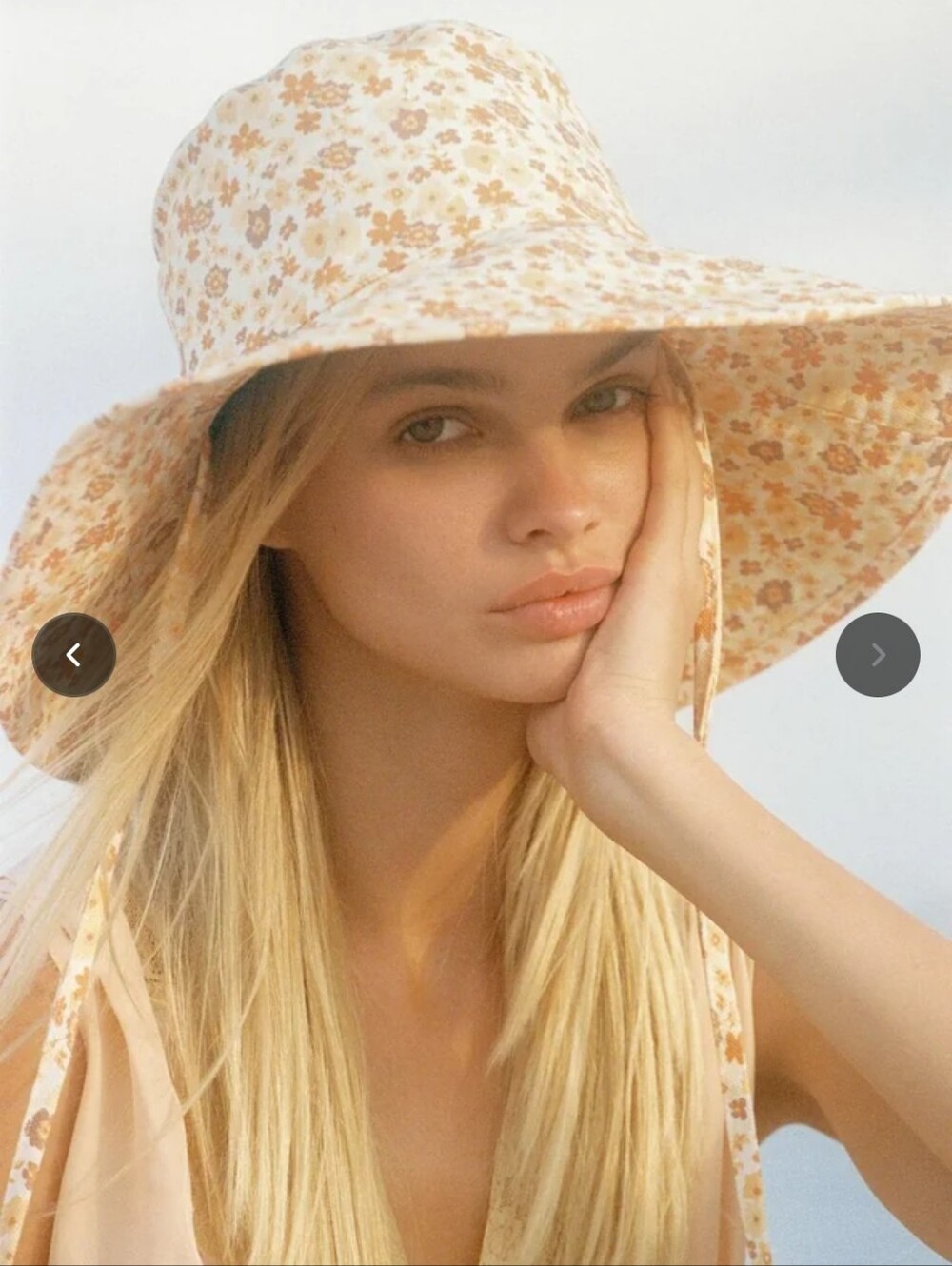 Lack of Color Holiday Bucket Hat in the Peach Bloom pattern